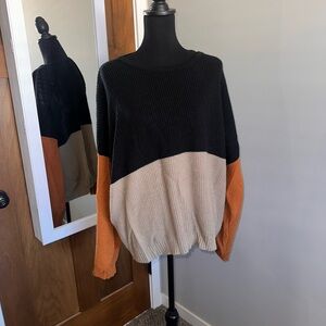 Black, Cream, and Orange Colorblock Sweater